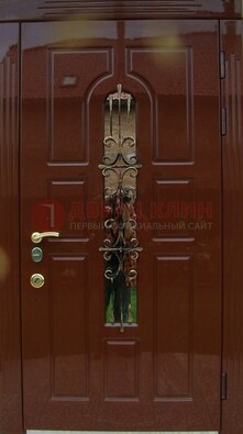 Красивая металлическая дверь со стеклом и ковкой ДСК-33 в Ульяновске