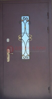 Металлическая дверь со стеклом и ковкой ДСК-77 в Ульяновске
